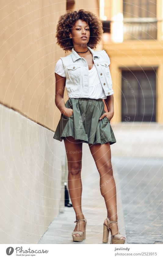 Young black woman, afro hairstyle, standing in the street Lifestyle Style Beautiful Hair and hairstyles Face Human being Young woman Youth (Young adults) Woman