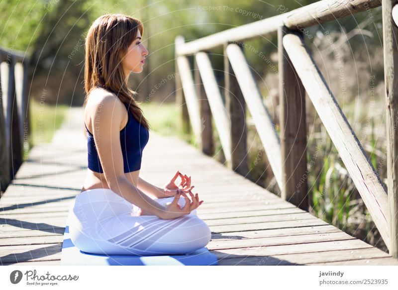 Young woman doing yoga in nature. Lifestyle Beautiful Body Relaxation Meditation Summer Sports Yoga Human being Youth (Young adults) Woman Adults 1