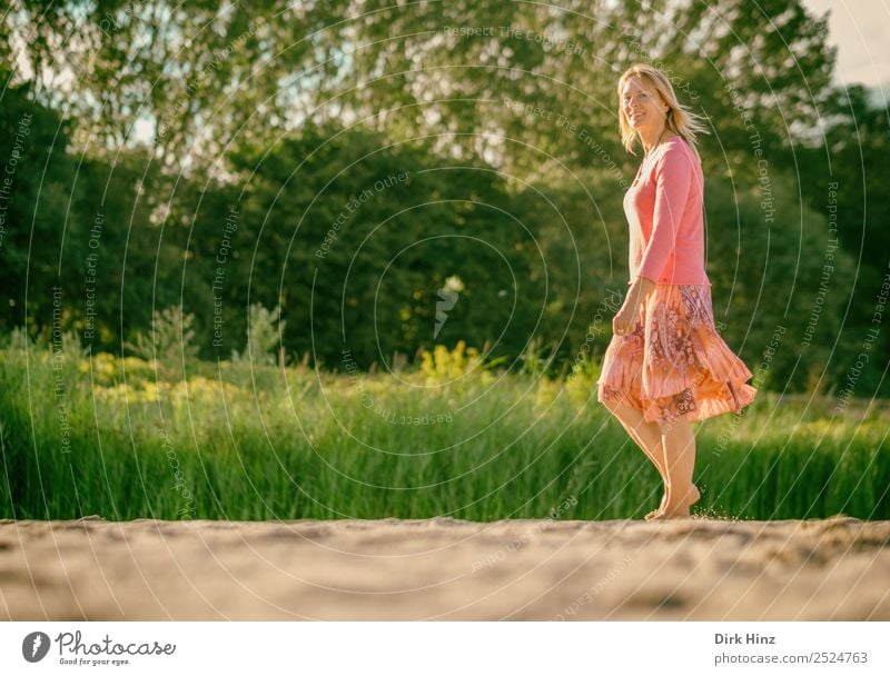 Woman walking on the beach in the sunlight Lifestyle Vacation & Travel Tourism Trip Summer Summer vacation Beach Human being Feminine Adults Mother 1