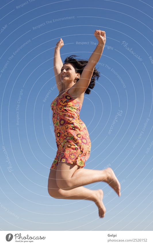 Beautiful girl jumping a over sky background Joy Happy Face Leisure and hobbies Vacation & Travel Dance Sports Success Human being Woman Adults Arm Hand Feet