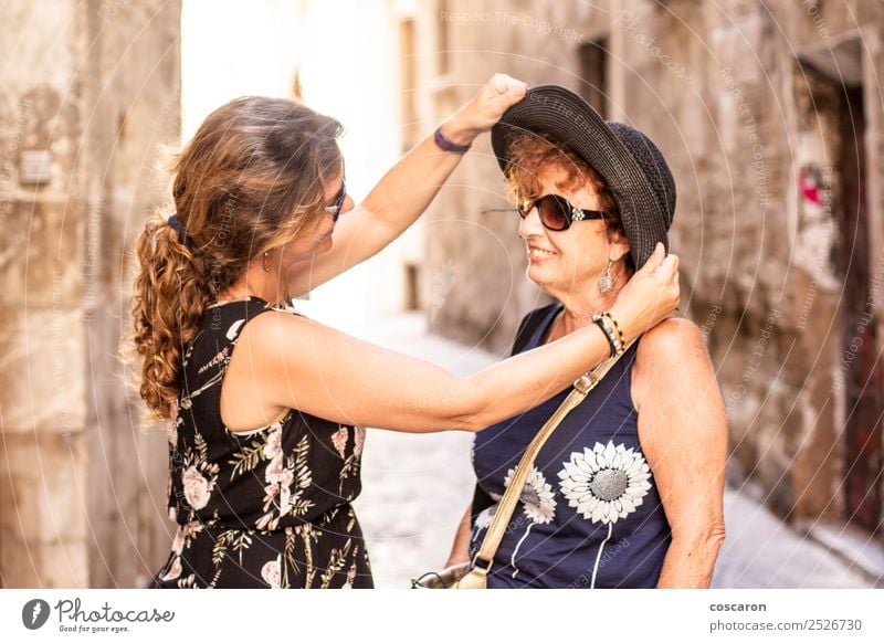 Mother and daughter on the street at summer Lifestyle Shopping Joy Happy Beautiful Vacation & Travel Tourism Summer vacation Human being Feminine Woman Adults