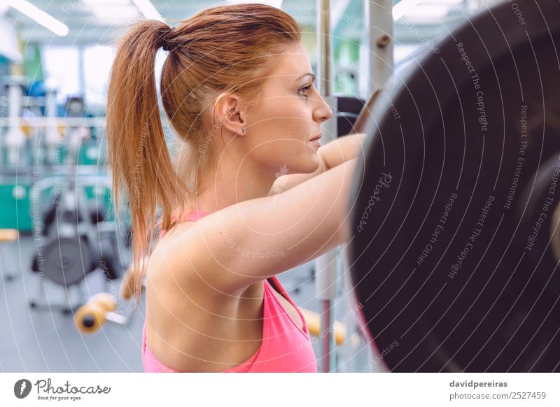 Woman resting after lifting barbell on muscular training Lifestyle Beautiful Body Sports Human being Adults Arm Fitness Authentic Thin Eroticism Muscular Strong