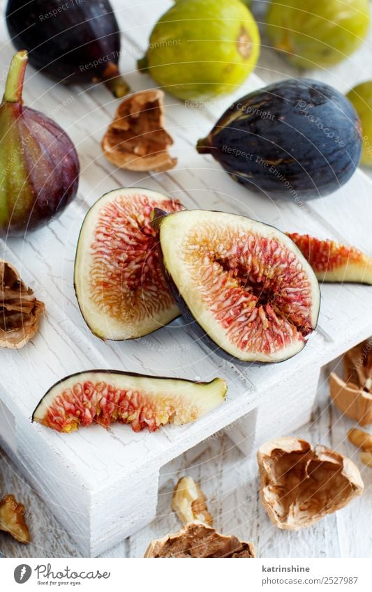 Fresh purple and green figs Fruit Dessert Vegetarian diet Diet Exotic Summer Autumn Wood Delicious White Fig food Organic Purple Mature seed Slice sweet Vitamin