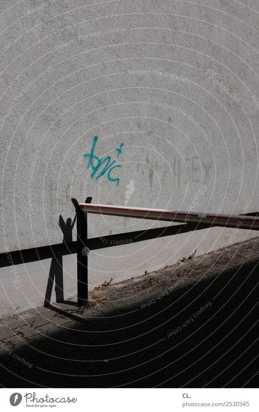 barrier Wall (barrier) Wall (building) Transport Traffic infrastructure Street Lanes & trails Control barrier Sign Characters Graffiti Gloomy Gray End