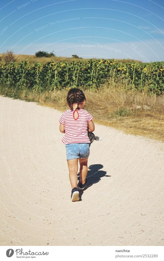 Back view of a little girl walking in nature Lifestyle Style Wellness Adventure Freedom Human being Feminine Child Toddler Girl Infancy 1 1 - 3 years