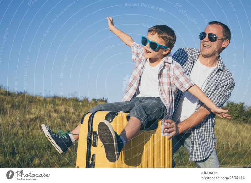 Father and son standing on the road at the day time. Lifestyle Joy Happy Playing Vacation & Travel Tourism Trip Adventure Freedom Camping Summer Hiking Sports