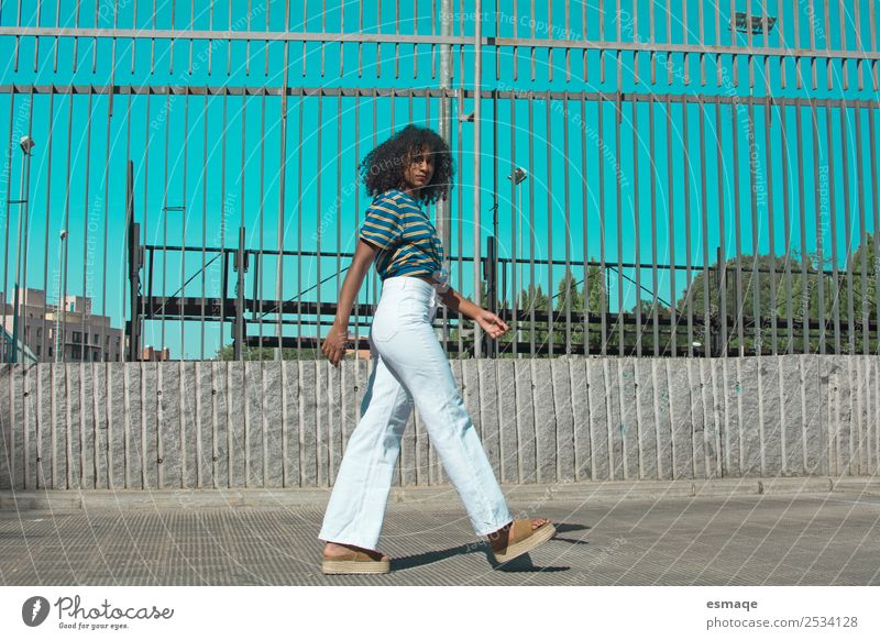 young woman walking on the street Lifestyle Exotic Joy Wellness Human being Feminine Young woman Youth (Young adults) 1 Village Small Town Fashion Clothing