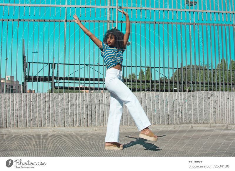 Portrait of mulatoo woman on street Lifestyle Style Healthy Wellness Sports Human being Young woman Youth (Young adults) 1 Nature Town Fashion Afro Think