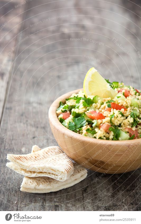 Tabbouleh salad and ingredients Table Salad couscous Vegetable Tomato Cucumber Parsley Mint Vegan diet Vegetarian diet Healthy Eating Nutrition Diet Bowl Lemon