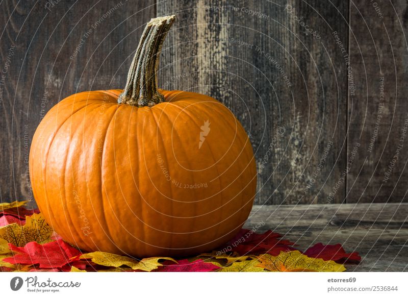 Pumpkin and autumn leaves on wooden background Autumn Food Healthy Eating Food photograph Orange Vegetable Hallowe'en Festive Seasons Holiday season October