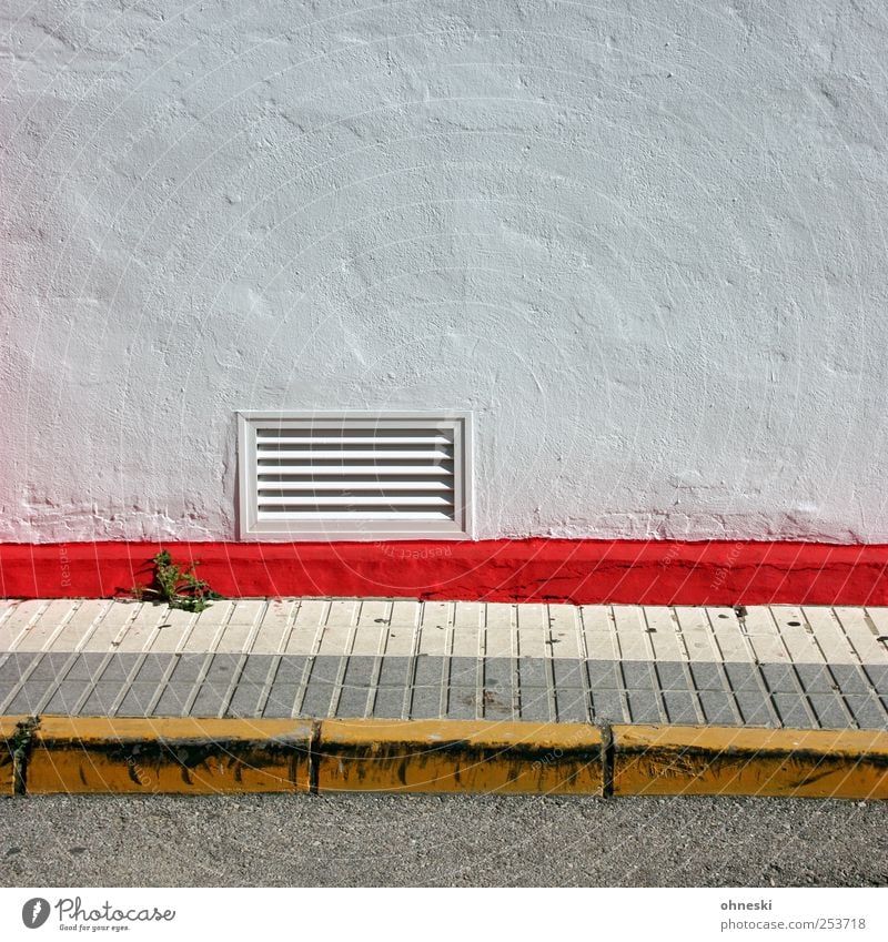 sidewalk Weed Deserted Wall (barrier) Wall (building) Facade Ventilation shaft Vent slot Lanes & trails Sidewalk Red Colour photo Multicoloured Exterior shot