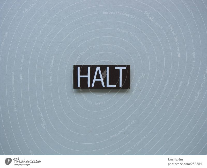 STOP Characters Signs and labeling Communicate Sharp-edged Gray Black White Responsibility Attentive Watchfulness Caution Dangerous Resolve Threat Protest