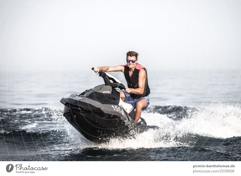 Jet ski fun on the Lago Lifestyle Luxury Joy Happy Swimming & Bathing Leisure and hobbies Vacation & Travel Tourism Adventure Freedom Summer Sun Ocean Waves