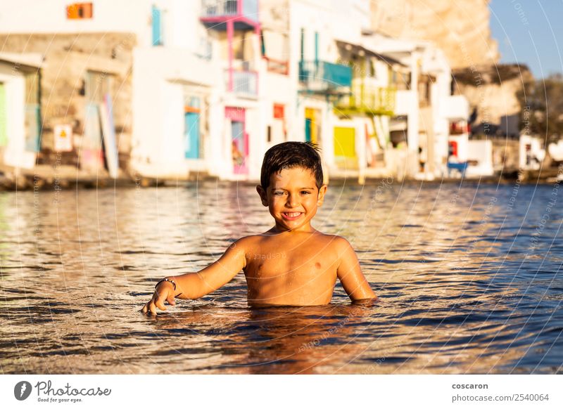 Little kid playing and swimming on the sea Lifestyle Joy Happy Beautiful Leisure and hobbies Playing Vacation & Travel Summer Beach Ocean Island Child