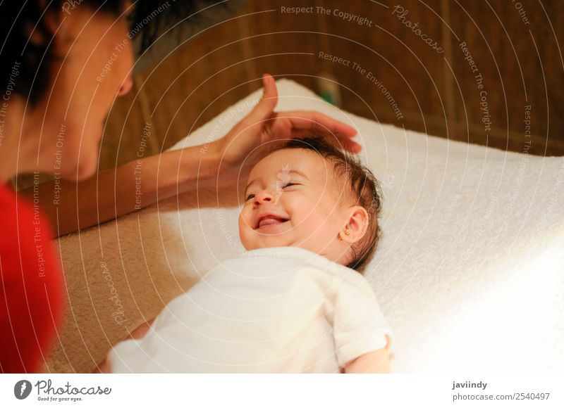 Baby girl two months old smiling to her mother at home Joy Happy Beautiful Face Life Child Camera Human being Girl Young woman Youth (Young adults) Woman Adults