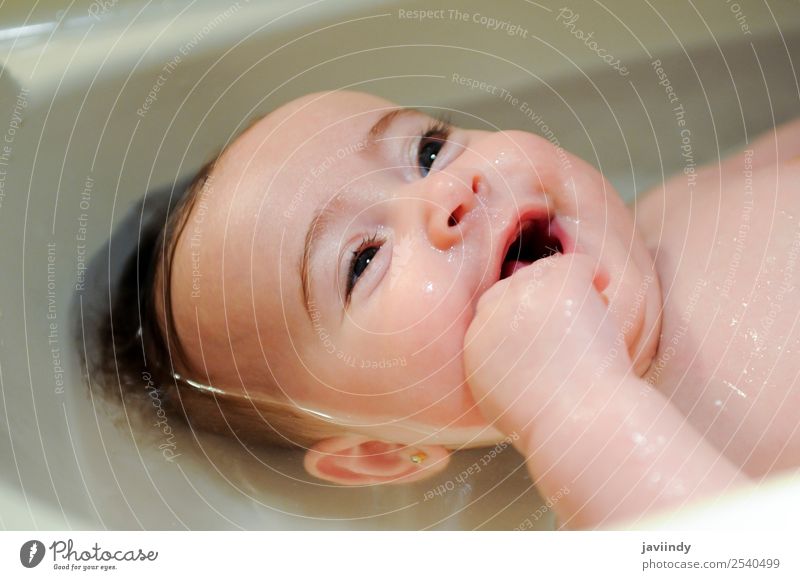 Baby girl four months old having her bath smiling Happy Beautiful Face Life Bathtub Bathroom Child Human being Feminine Girl Infancy 1 0 - 12 months Sleep