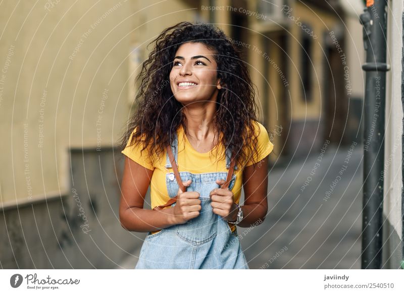 Young Arab tourist woman with black curly hairstyle Lifestyle Style Happy Beautiful Hair and hairstyles Face Tourism Human being Feminine Young woman