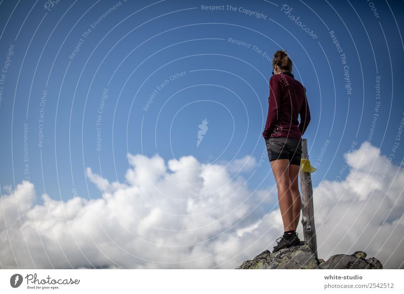 Lighthouse above the clouds. Woman Adults Hiking Mountaineering Wilderness Nature Vantage point Above the clouds Clouds Love of nature Colour photo