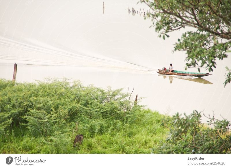 water trace Human being Masculine Young man Youth (Young adults) Life Nature Landscape Plant Water Tree Bushes Virgin forest Waves River bank Boating trip