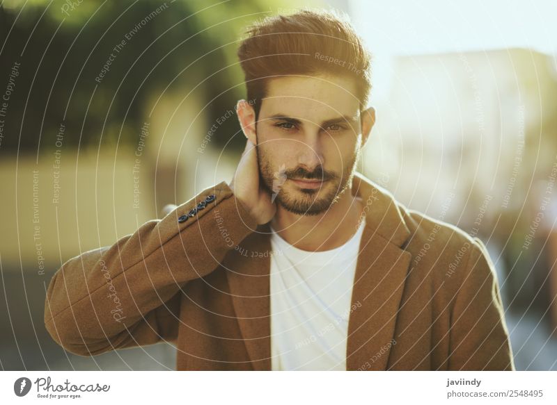 Young man wearing winter clothes in the street. Lifestyle Elegant Style Beautiful Hair and hairstyles Winter Human being Masculine Youth (Young adults) Man