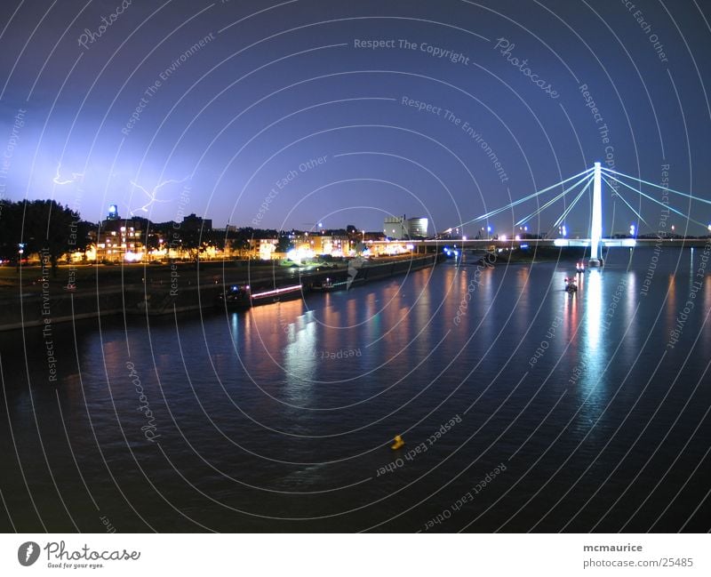 thunderstorm about cologne Lightning Night Cologne Long exposure Town Thunder and lightning Blue Rhine River Bridge