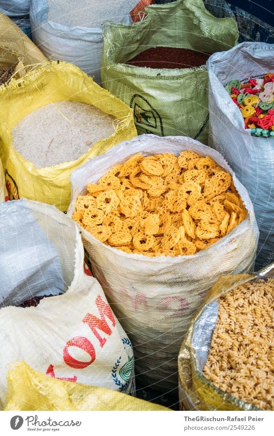 snacks Food Brown Multicoloured Yellow Orange Snack Rice Sri Lanka Sack Many Selection Noodles Dough Colour photo Exterior shot Detail Deserted Evening