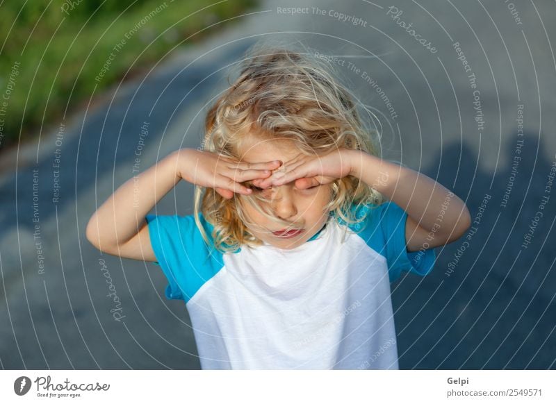 Little boy covering his eyes by the sun, on a sunny day Beautiful Face Summer Sun Child Human being Baby Boy (child) Man Adults Infancy Hand Environment Nature