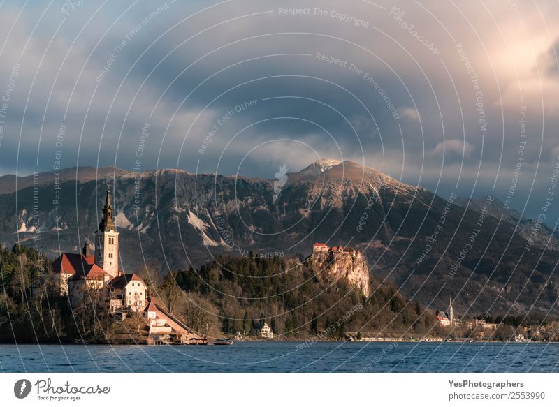 Slovenian town with lake and mountains Vacation & Travel Island Nature Landscape Peak Bled Church Castle Building Tourist Attraction Landmark Bled lake