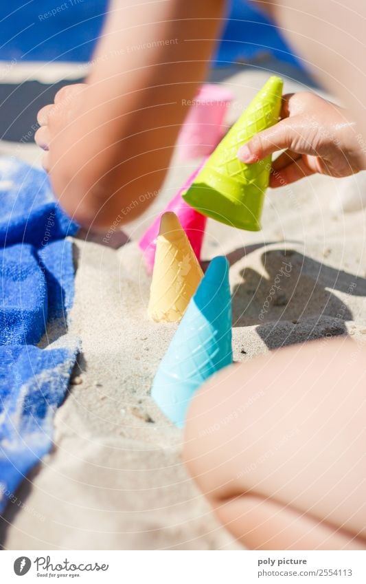 Child make ice cream on the beach with moulds Life Contentment Leisure and hobbies Playing Vacation & Travel Tourism Freedom Summer Summer vacation Sun