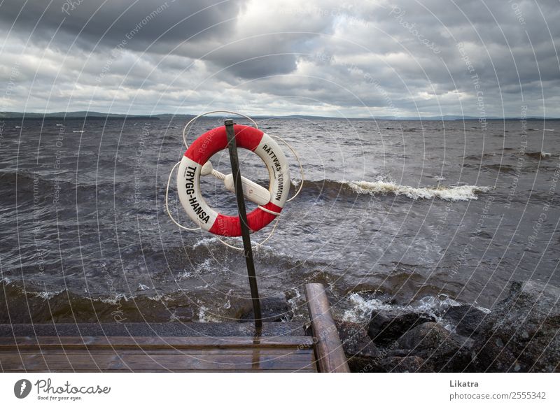 Lake Siljan during storm - Lifebelt Freedom Waves Ladder Landscape Water Clouds Bad weather Gale Sweden Deserted Footbridge Life belt Dark Wild Determination