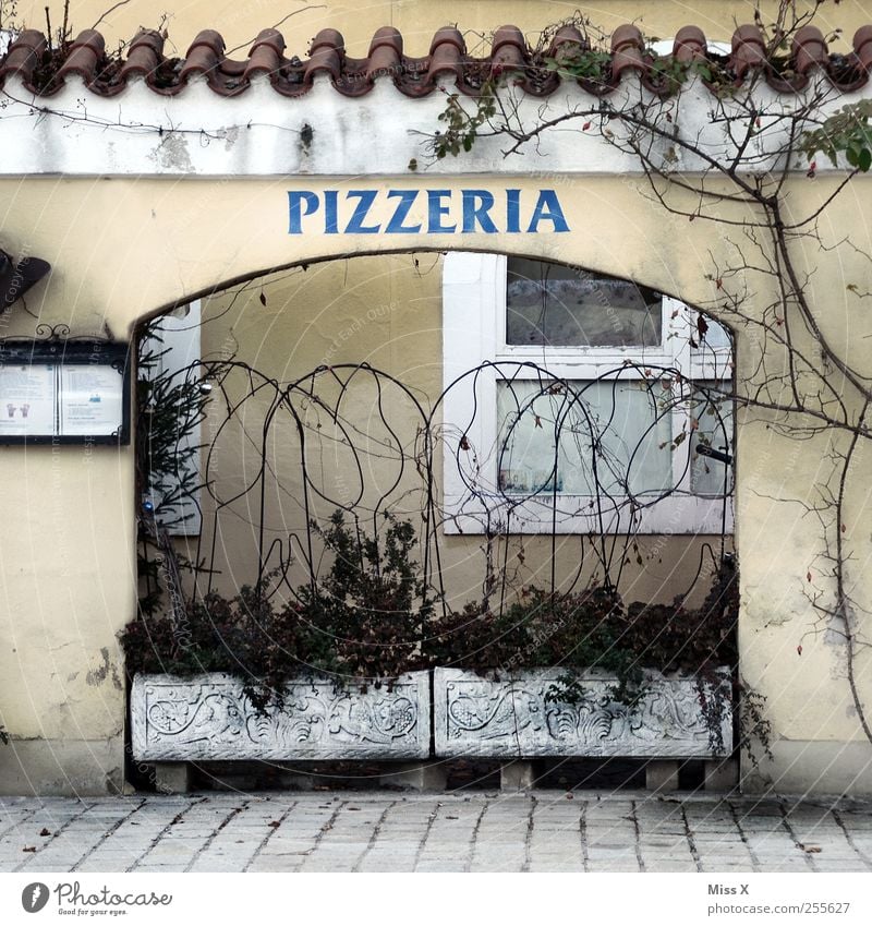 1A Pizza Nutrition Dinner Italian Food Restaurant Wall (barrier) Wall (building) Facade Window Old pizzeria Colour photo Exterior shot Deserted