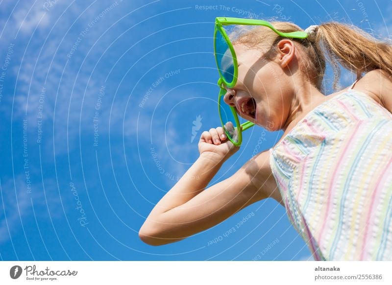 happy little girl in big sunglasses Lifestyle Style Joy Happy Beautiful Face Leisure and hobbies Playing Vacation & Travel Summer Sun Child Human being Woman