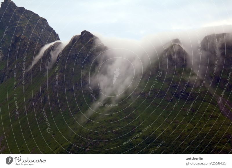 Clouds in Å Rock Mountain Peak Snowcapped peak Mountain ridge Vacation & Travel Fjord Sky Heaven Landscape Maritime Nature Norway Travel photography Scandinavia