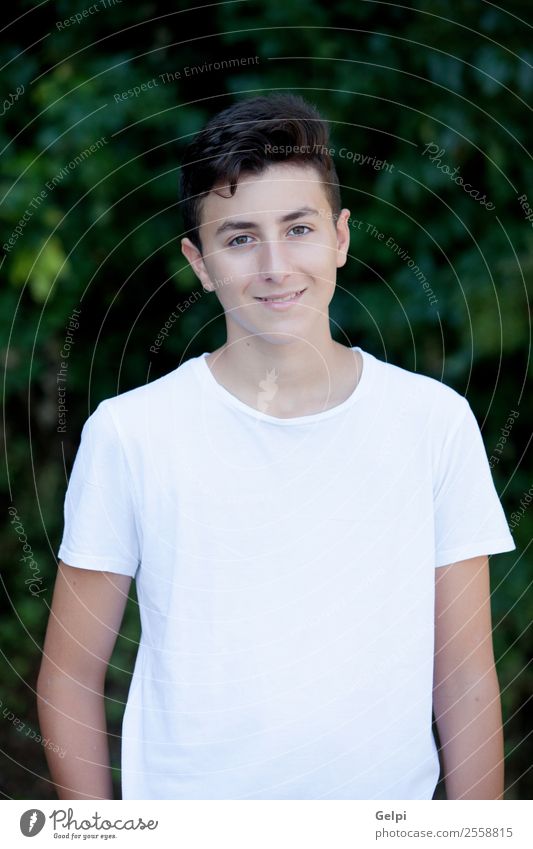 Handsome brown-haired teen Lifestyle Style Happy Face Summer Human being Boy (child) Man Adults Youth (Young adults) Culture Nature Park Fashion Smiling