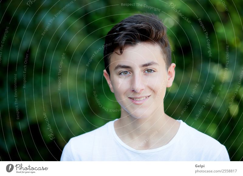 Handsome brown-haired teen Lifestyle Style Happy Face Summer Human being Boy (child) Man Adults Youth (Young adults) Culture Nature Park Fashion Smiling