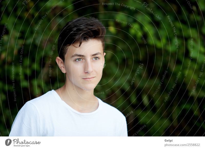 Handsome brown-haired teen Lifestyle Style Happy Face Summer Human being Boy (child) Man Adults Youth (Young adults) Culture Nature Park Fashion Smiling