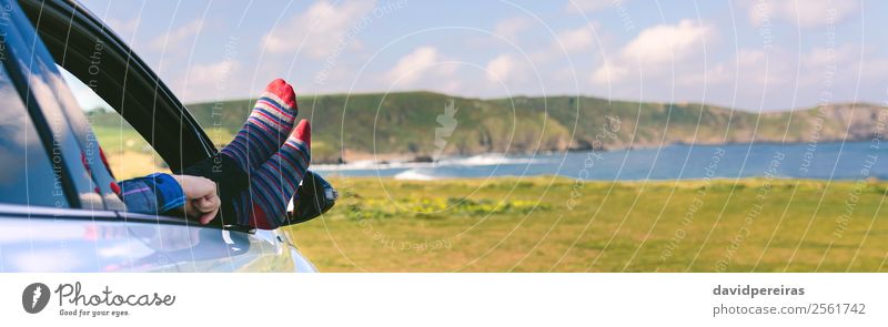 Unrecognizable man resting feet up sitting on the car Lifestyle Relaxation Leisure and hobbies Vacation & Travel Trip Adventure Human being Man Adults Landscape