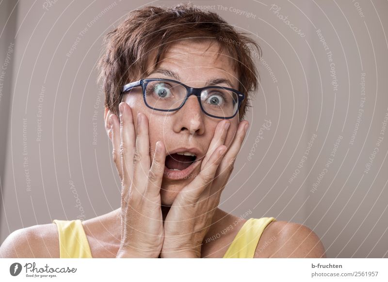 Woman gets scared Adults Face 1 Human being 30 - 45 years Eyeglasses Touch Fear Horror Surprise Scare Facial expression Amazed Gesture Emotions Looking