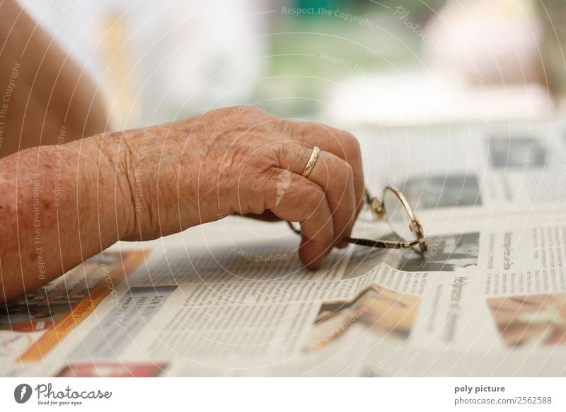 Hand of an elderly lady Woman Adults Female senior Family & Relations Senior citizen 60 years and older Beginning Fear Grandmother Eyeglasses Newspaper