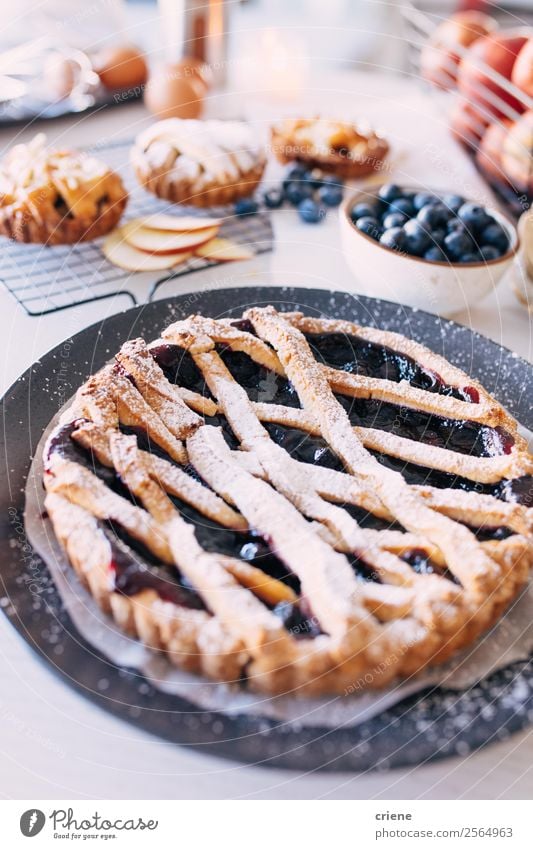 close up of selfmade blueberry cakes in kitchen Fruit Dessert Nutrition Summer Table Kitchen To enjoy Fresh Delicious Blueberry Pie food Muffin Home-made sweet