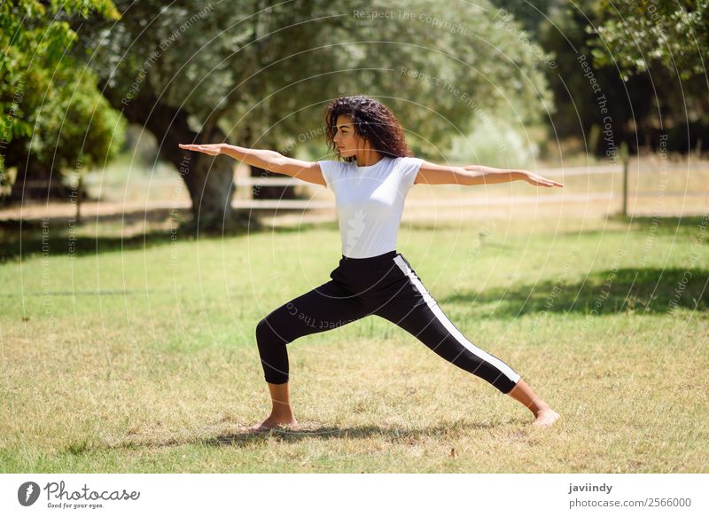 Young Arab woman doing yoga in nature. Lifestyle Beautiful Body Relaxation Calm Meditation Summer Sports Yoga Human being Feminine Young woman