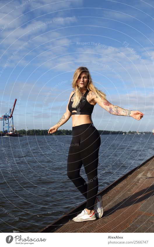 Young woman standing on a pontoon on the Elbe in Hamburg Joy Beautiful Wellness Life Summer Fitness Sports Training Track and Field Sportsperson Jogging