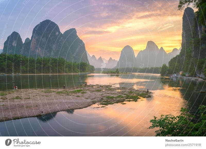 Amazing sunset in Xinping, Yangshuo, China Vacation & Travel Tourism Trip Adventure Mountain Environment Nature Landscape Water Sky Clouds Horizon Sunrise