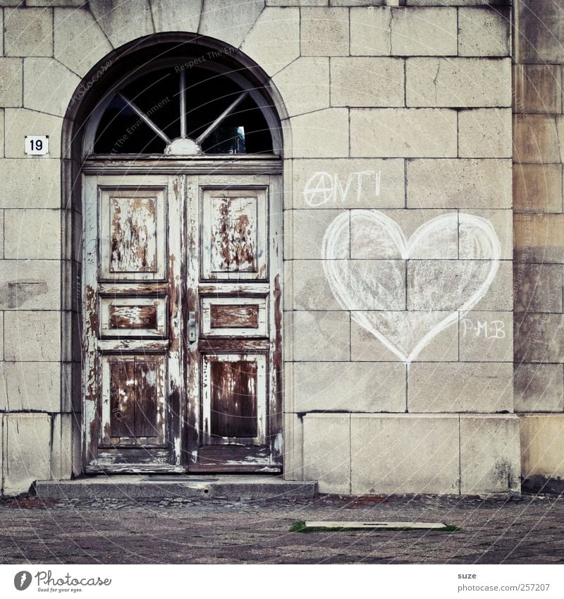 The last door Living or residing House (Residential Structure) Wall (barrier) Wall (building) Facade Door Graffiti Heart Old Authentic Brown Gray Mysterious