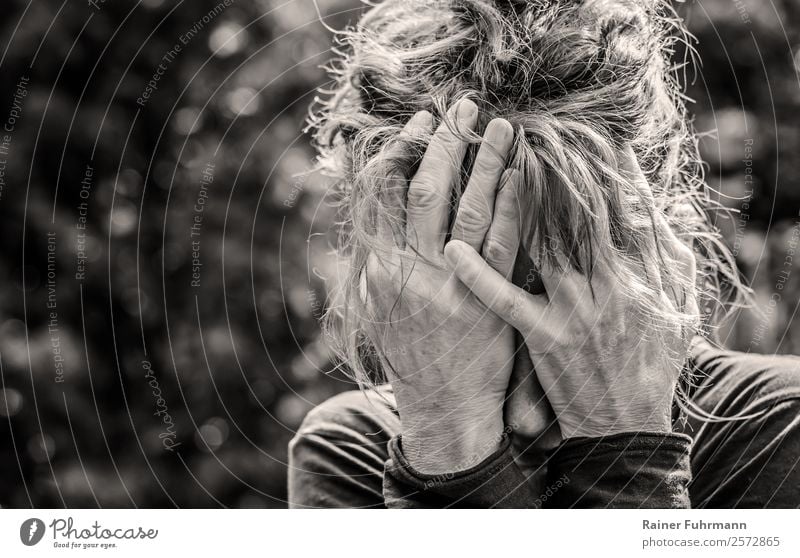 a woman desperately holding her hands in front of her face Human being Feminine Woman Adults Head Hand 1 Think Sadness Cry Old Illness Concern Grief Death Pain