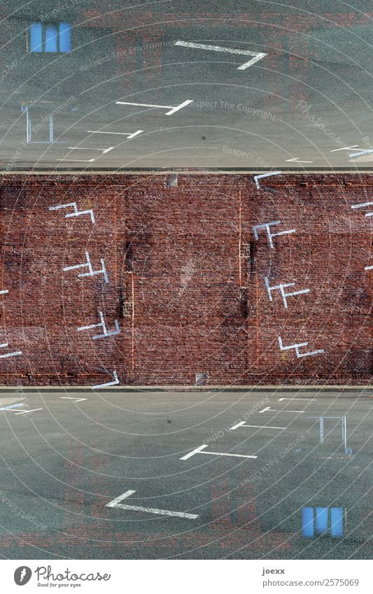 parking area Places Wall (barrier) Wall (building) Parking lot Signs and labeling Brown Gray White Bizarre Chaos Idea Art Problem solving Far-off places Growth