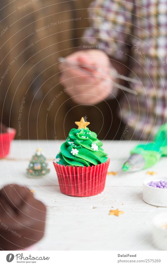 Making cupcake for christmas time Baking Box Butter Baked goods Candy Feasts & Celebrations Christmas & Advent Cream Cupcake Decoration Dessert Festive Food