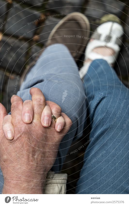 together - hands interlocking on one knee in jeans Senior citizen Hand Woman Adults Man Couple Partner Fingers Legs Feet 2 30 - 45 years 45 - 60 years