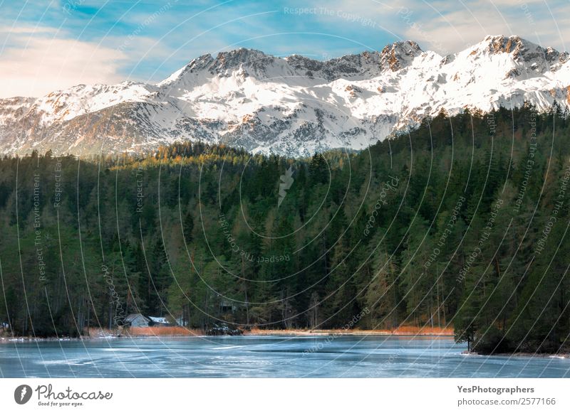 Snow-capped mountains and frozen lake Tourism Winter Winter vacation Mountain Nature Landscape Weather Beautiful weather Ice Frost Rock Alps Peak