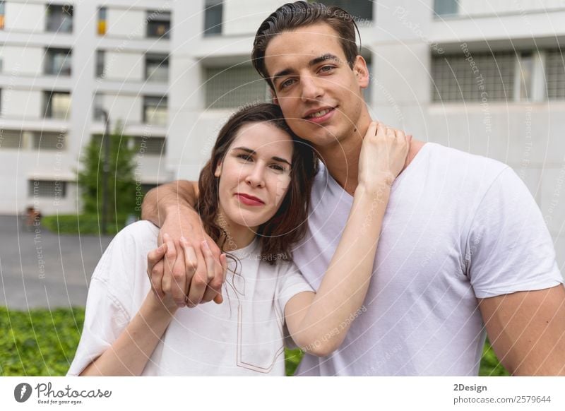 Young beautiful couple posing wearing jeans and t-shirt Lifestyle Style Happy Beautiful Woman Adults Man Friendship Couple 2 Human being 18 - 30 years